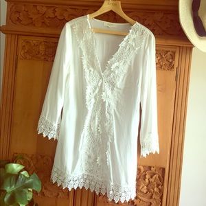 Stunning white coverup with floral embroidery